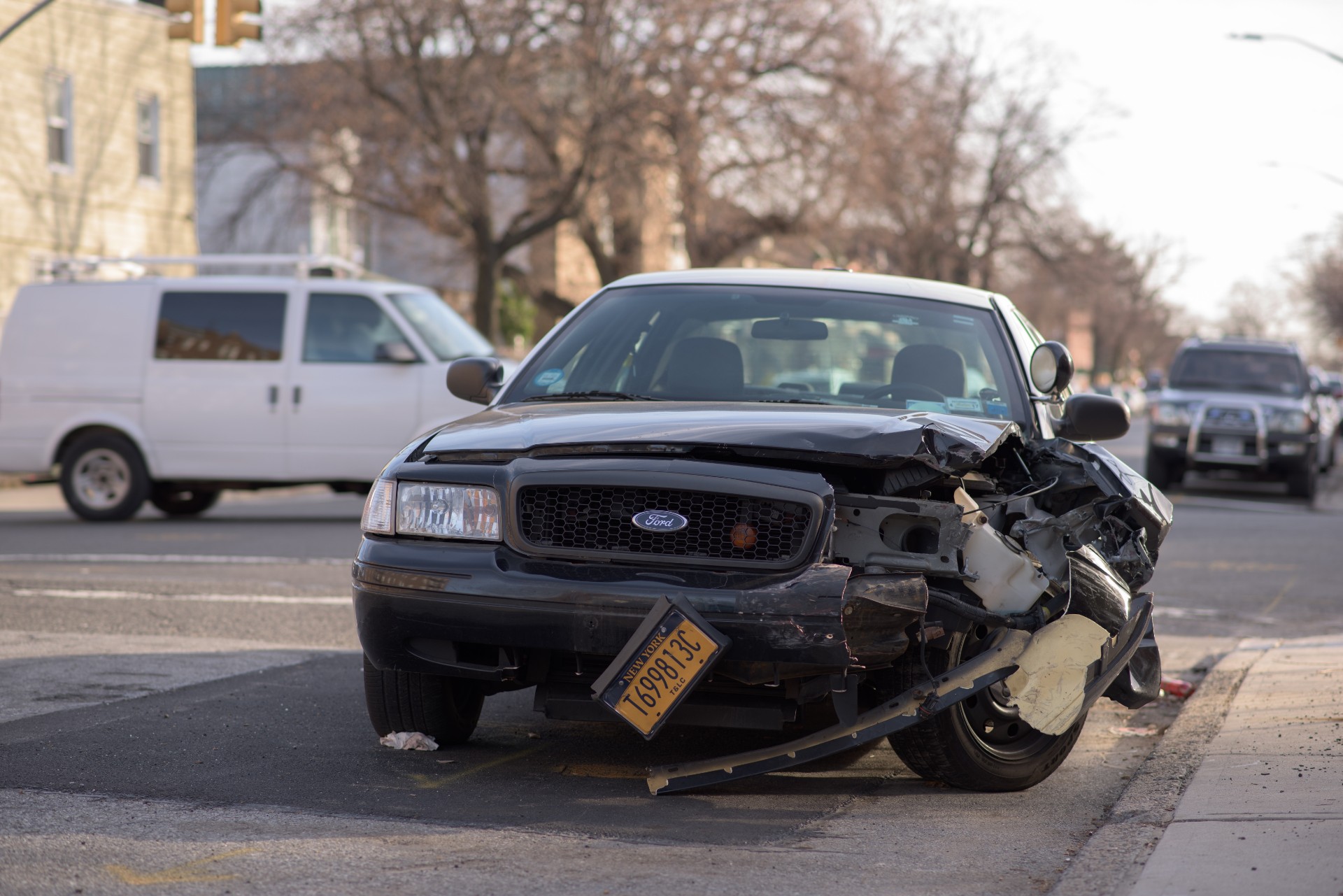 Car with front end damage from crash